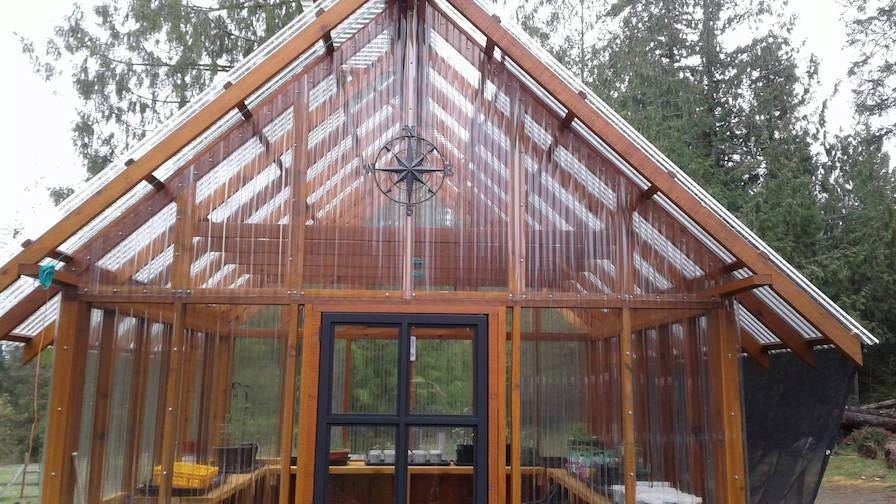 Cedar greenhouse with plants